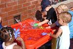 Children at a water table